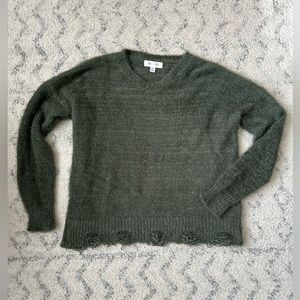 Distressed hem sweater. Size M/L. New without tags.
